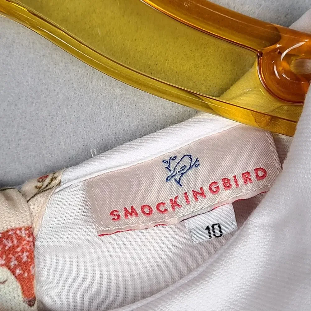 Forest brand smockingbird